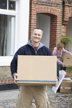 Removal team packing and loading items for an Enfieldlock home move