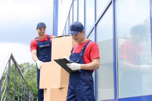 Man with van loading items for a local move