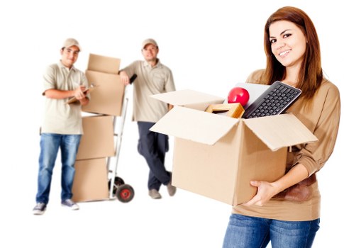Prepared moving boxes and furniture outside a property in Enfieldlock
