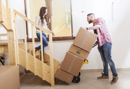 Commercial office move coordination with labelled boxes and furniture in Enfieldlock
