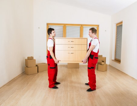 Local moving team organising belongings for a residential move