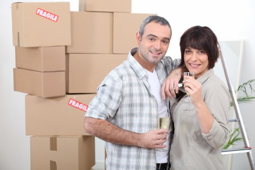 Packed moving boxes ready for transport in Enfieldlock